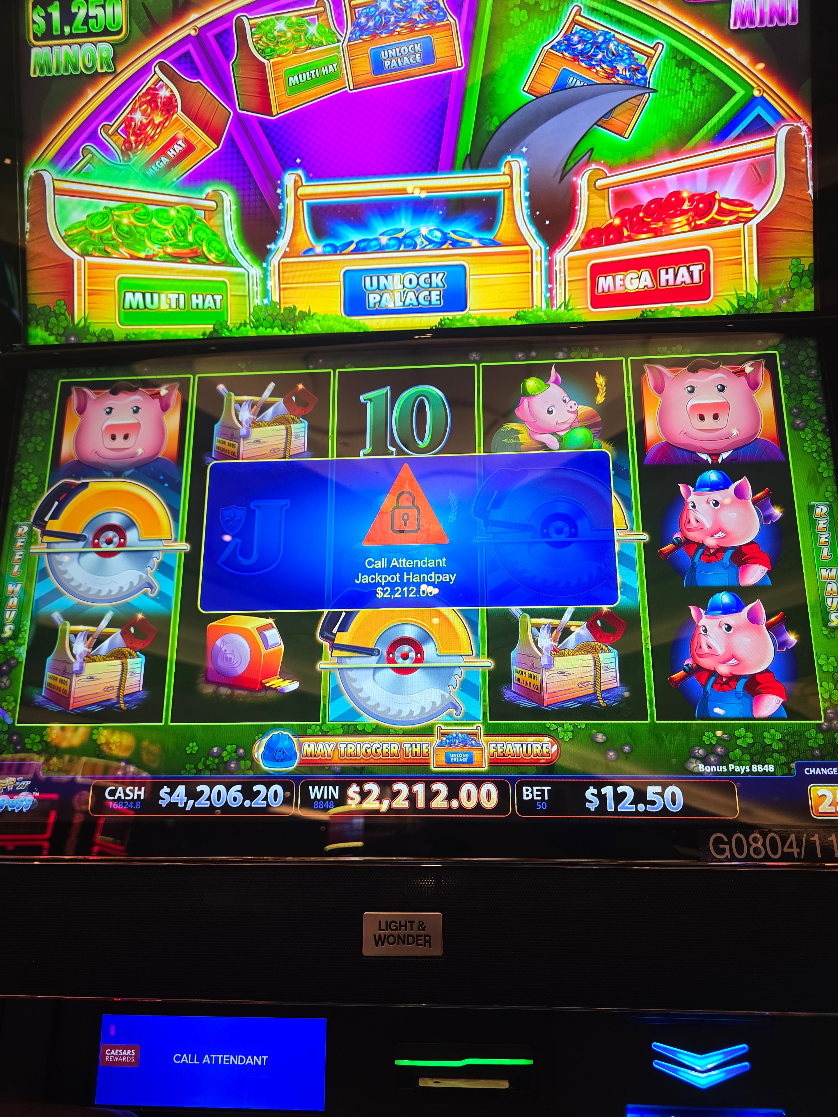 Three Little Pigs slot machine jackpot handpay showing $2,212.00